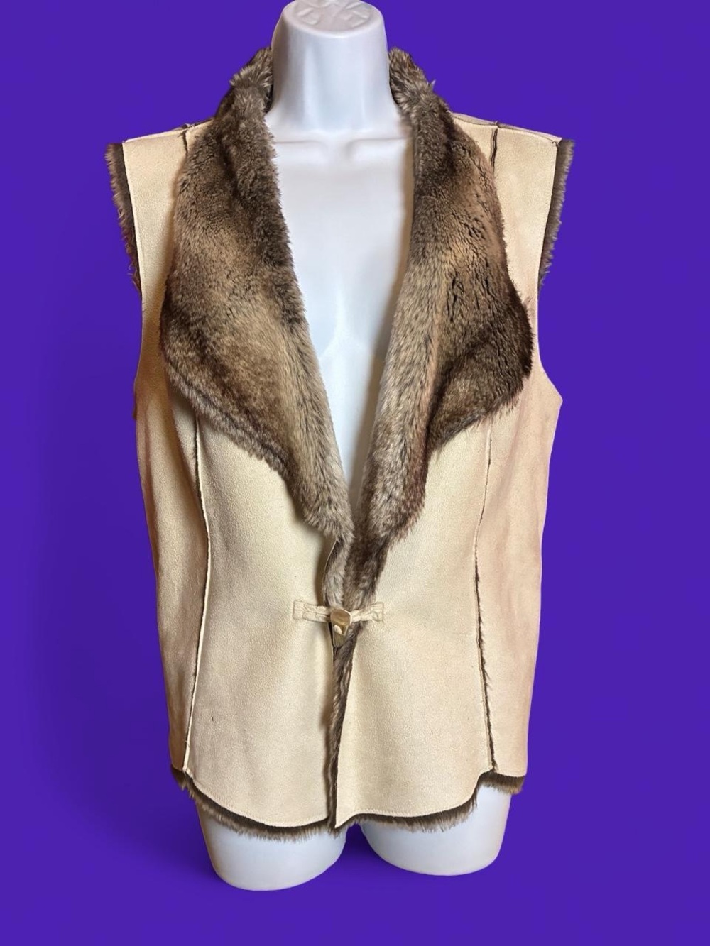 Coldwater Creek cream faux suede vest featuring a plush brown faux fur